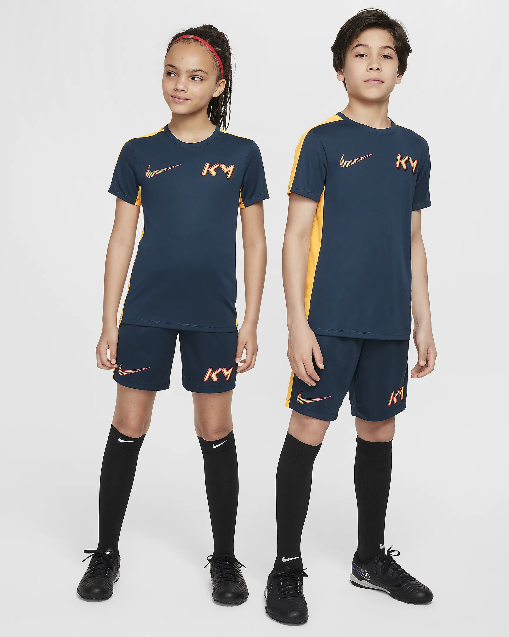 NIKE DRI-FIT ACADEMY23 SOCCER TOP JUNIOR KILIAN MBAPPÉ ARMORY NAVY/LASER